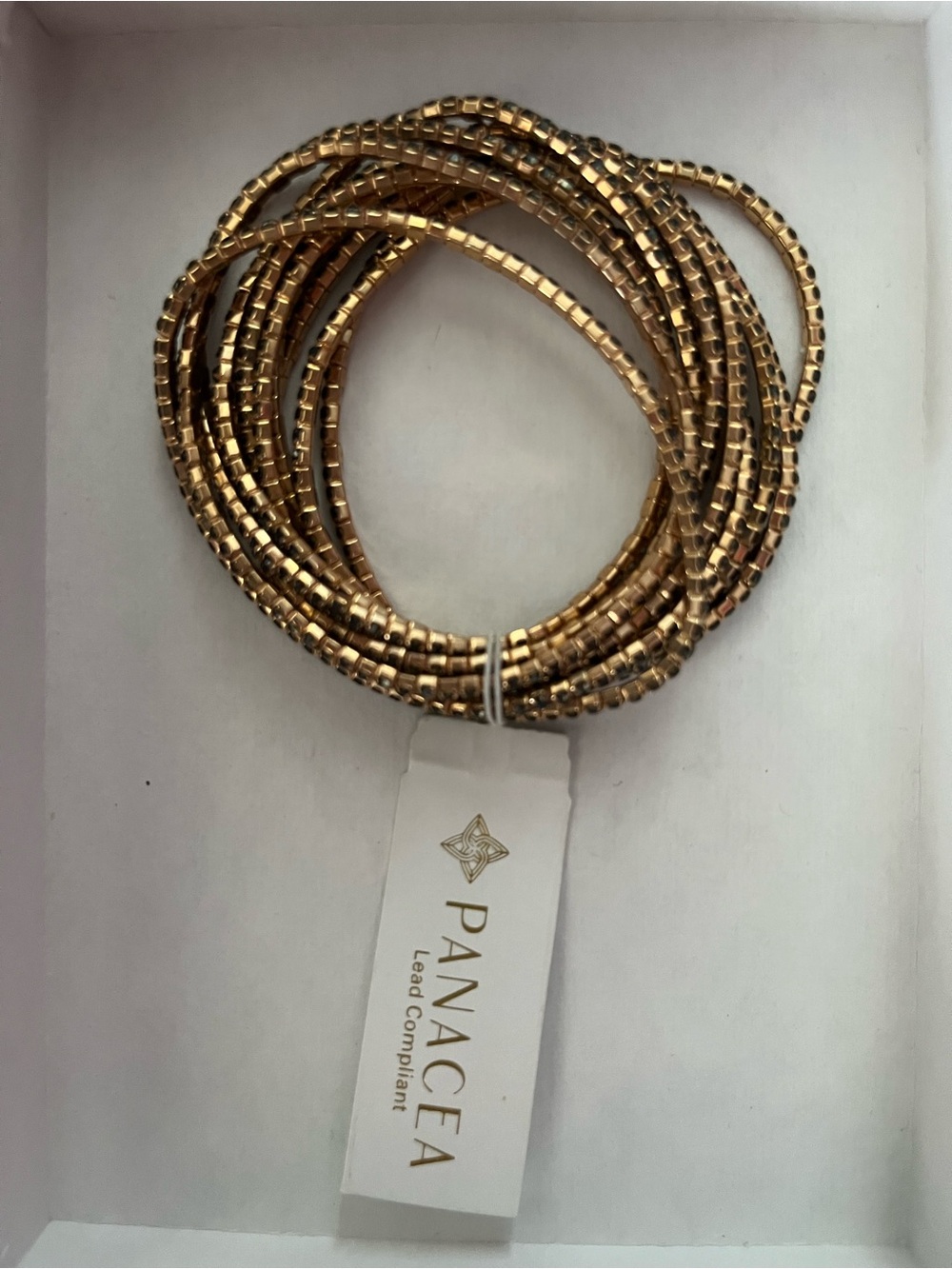 NWT Panace Gold/bronze/black tones Stretch Coil Bracelet .  Multi stranded